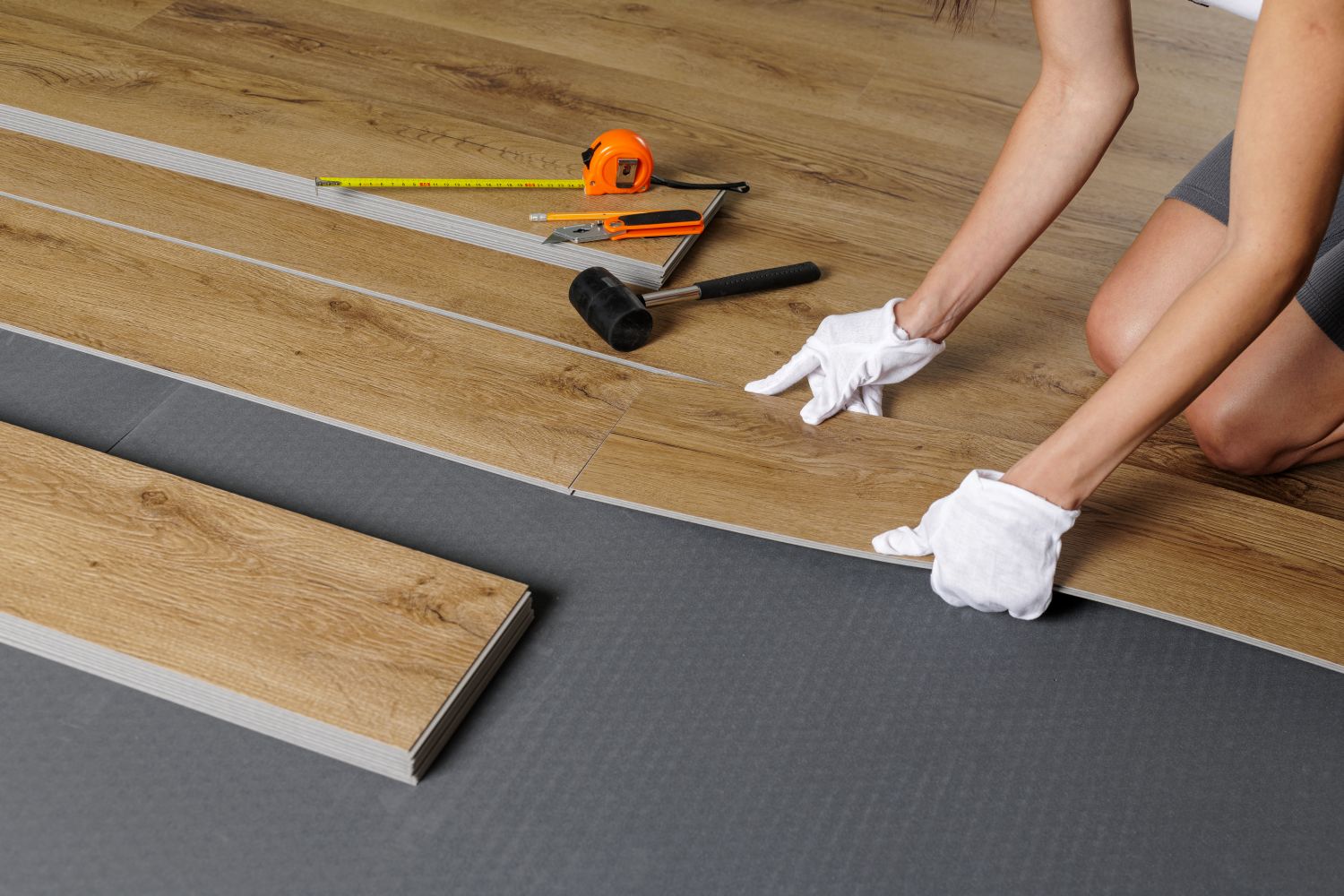 Install laminate flooring.